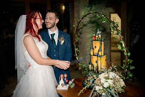 fantasy-castle-wedding-cake-cutting-moment.png