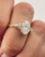 Bespoke Oval Diamond Engagement Ring with Marquise Side Stones in Yellow Gold