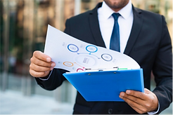 front-view-business-man-looking-charts_23-2148763828 1.png