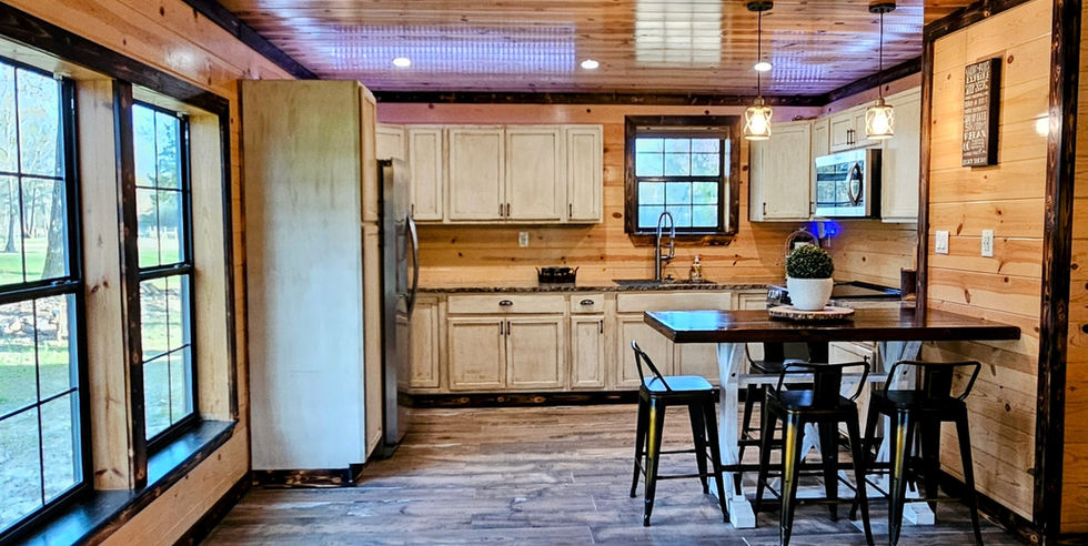 Groom's Cabin open space to transition between living area and kitchen.