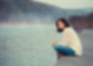 Girl  sitting by lake.jpg