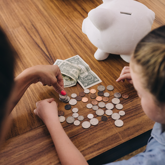 Mom and child counting money