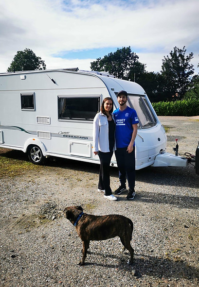claire and marc with their caravan