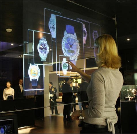 Films holographiques transparents contrecollés sur verre pour créer de véritables hologrammes par vidéo-projection.
