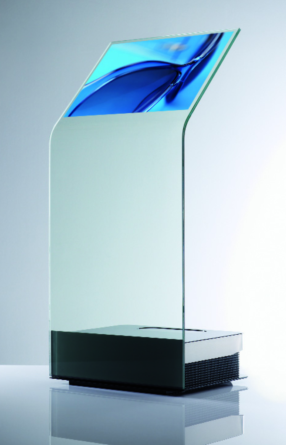 Mobilier interactif I-Pupitre 32'' au design épuré avec surface en verre bombée transparente, idéal présentations et salons.