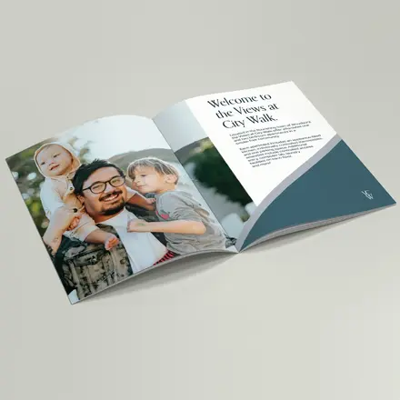 Interior page of a brochure featuring a father with two children on the left page. The right page features descriptive text.