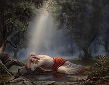 Jesus praying under a beam of light