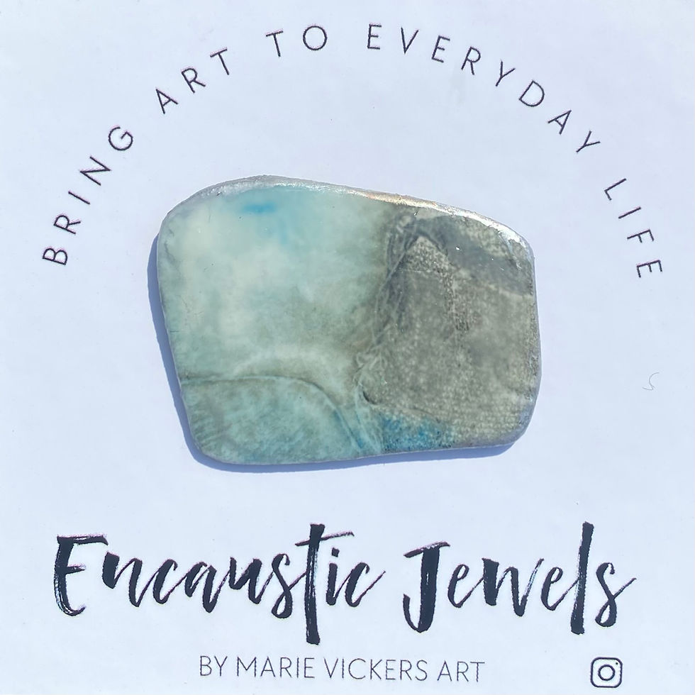 Original artwork coated in encaustic wax to make a wearable art brooch by Worthing artists, Marie Vickers