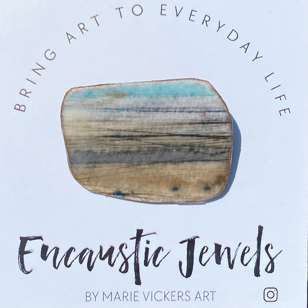 Original artwork coated in encaustic wax to make a wearable art brooch by Worthing artists, Marie Vickers