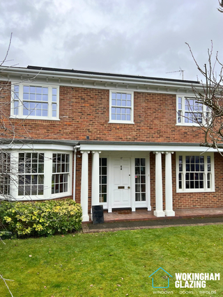 White woodgrain Roseview Heritage sliding sash uPVC windows installed in Wokingham