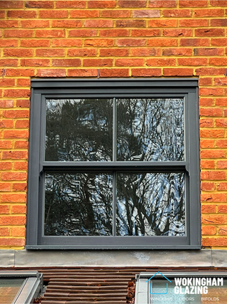 Anthracite grey Roseview Heritage sliding sash uPVC windows installed in Hook