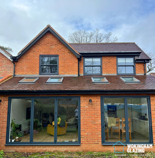 Anthracite grey Roseview Heritage sliding sash uPVC windows installed in Hook