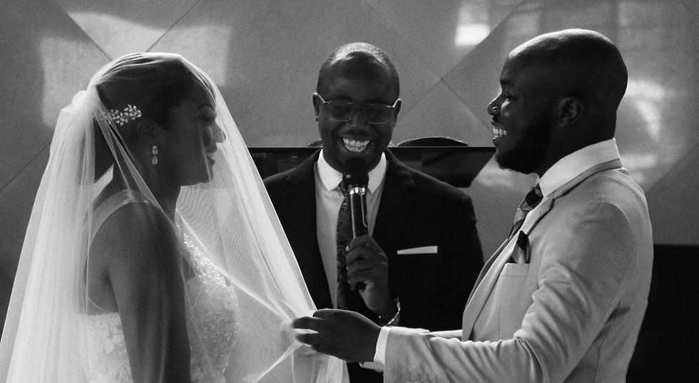 Couple laughing during their wedding ceremony