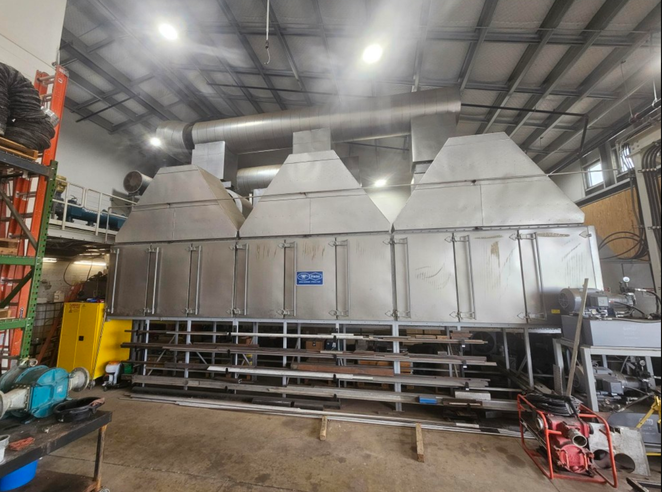 Wolverine Proctor CPM continuous conveyor industrial belt dryer in factory setting.
