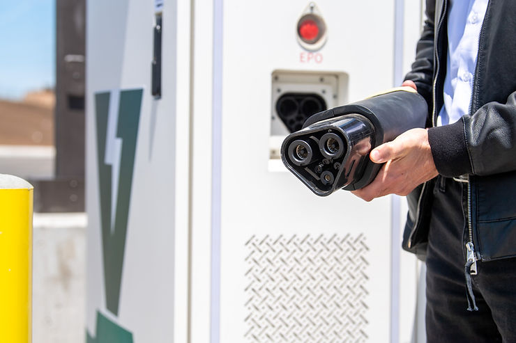 Salim Youssefzadeh holding MCS charging dispenser