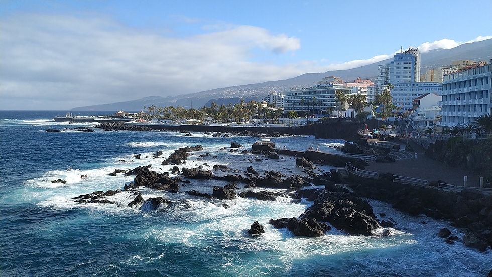 A coastal city with volcanic pools