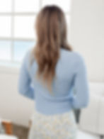 blue cardigan back view