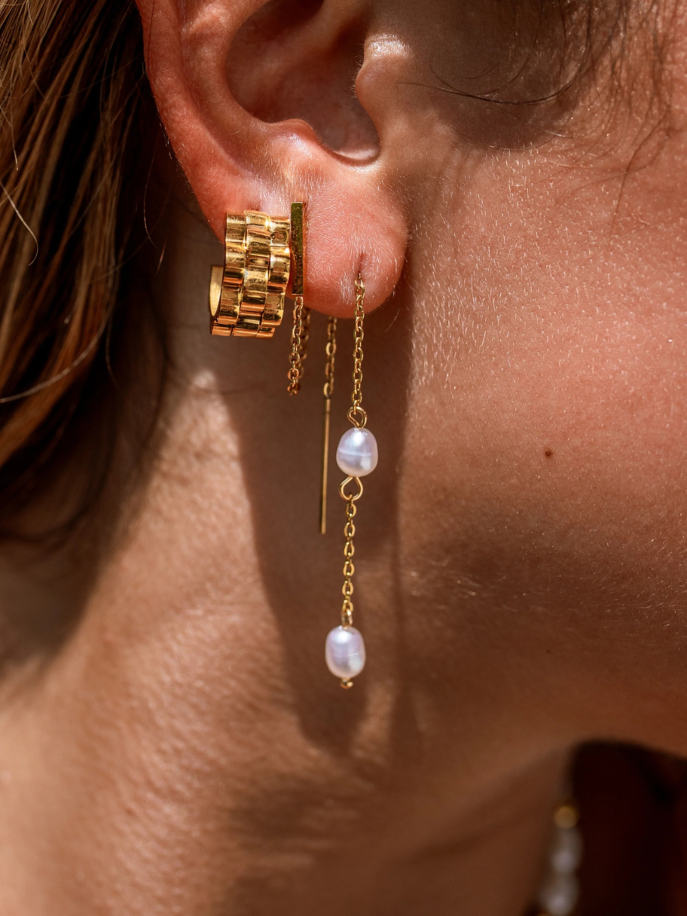 gold pearl earrings front view