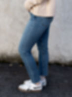 medium wash jeans side view