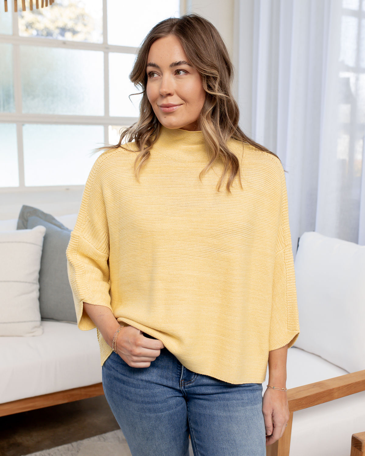 yellow sweater front view