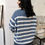 Thumbnail: blue sweater back view
