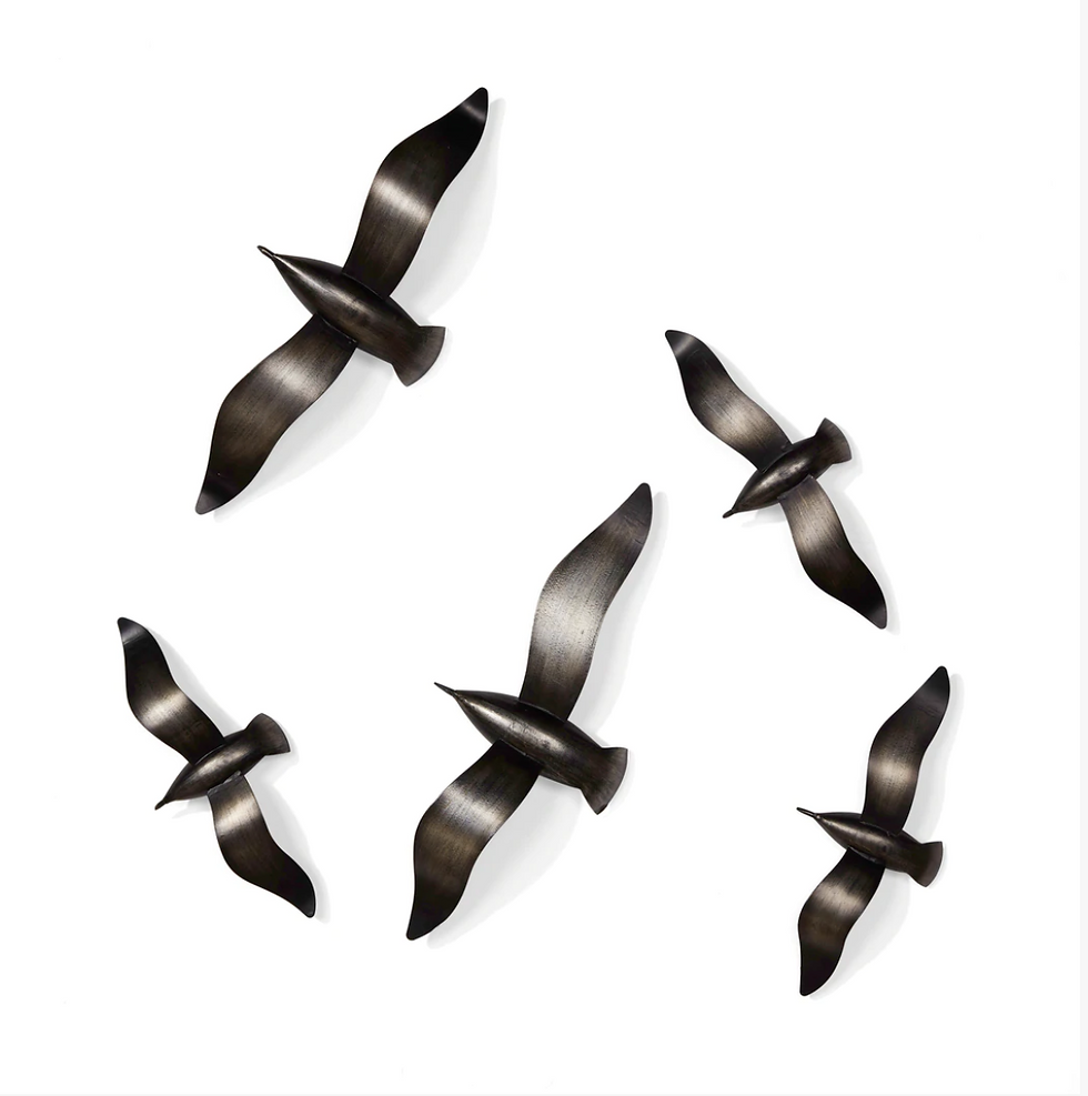 Wall art of five dark brushed metal birds in flight