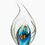 Thumbnail: Teardrop shaped glass art with two fish and an ocean wave and sea grass inside