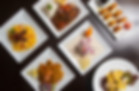 Typical Peruvian food seen from above on dark wooden table..jpg