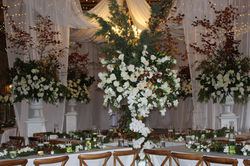 The Wedding Barn at L'Horne venue in middle GA featuring gorgeous floral arrangements and drapery
