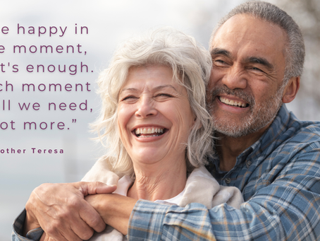 senior couple embracing with mother teresa quote overlaid on top