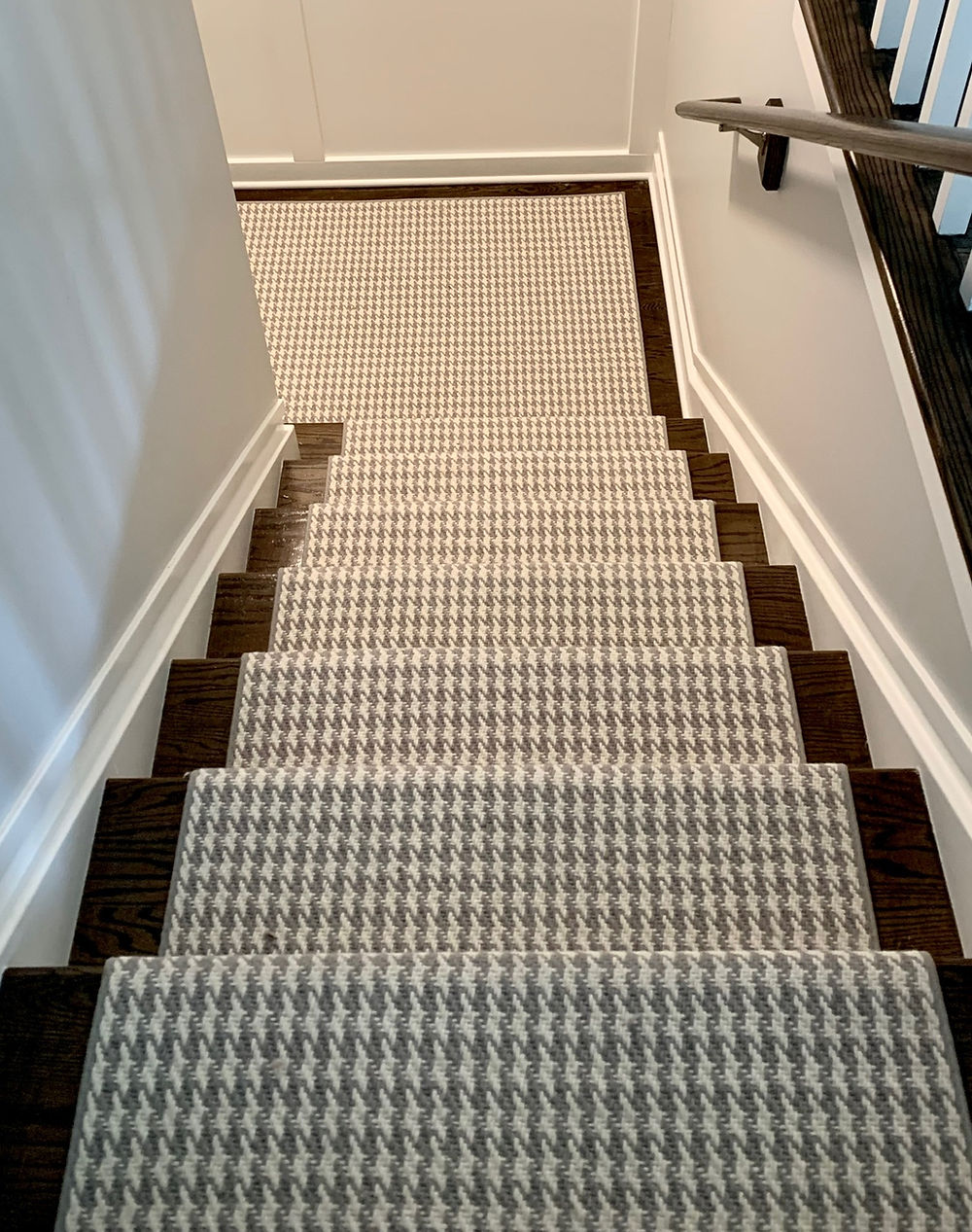 Staircase with patterned carpet runner