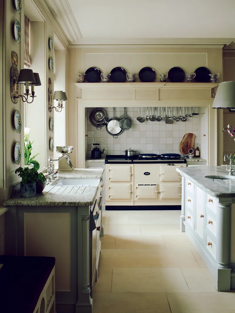 Country house kitchen with island and aga cooker