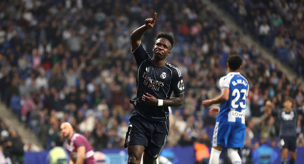 SOCCER: Vinicius double keeps Real's faint LaLiga hopes alive 