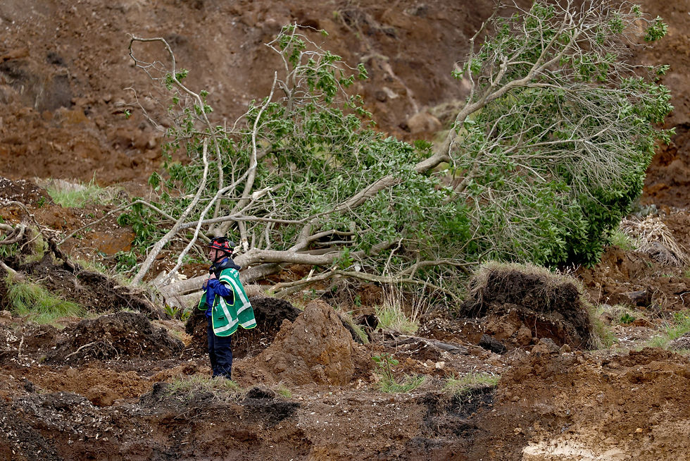 New Zealand authorities working to identify landslide victims