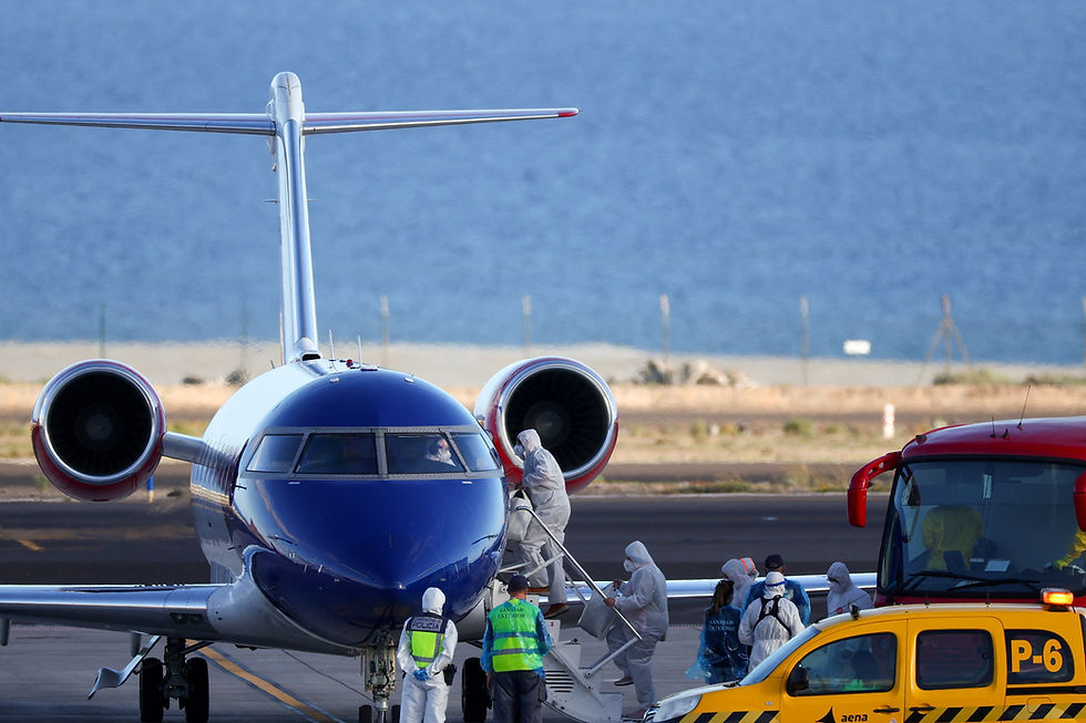 Crew and remaining passengers fly out of Tenerife after hantavirus-hit cruise