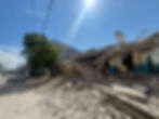 A man walks near a collapsed building after a magnitude 7.8 quake in General Santos, Mindanao Island, Philippines, June 8, 2026. Picture taken with a mobile phone. GenSan DEV/Handout via REUTERS