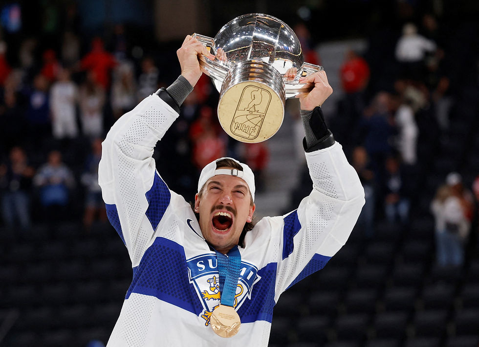 Finland’s Hannes Bjorninen celebrates IIHF gold medal win