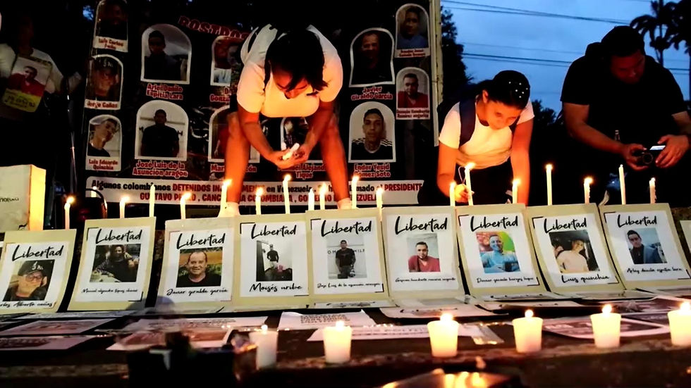Relatives light candles for Colombian prisoners held in Venezuela over 'illogical' charges