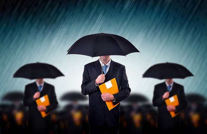 Businessmen with Umbrellas