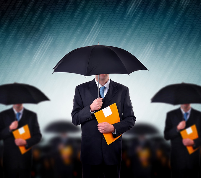 Businessmen with Umbrellas