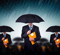 Businessmen with Umbrellas