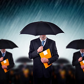Businessmen with Umbrellas
