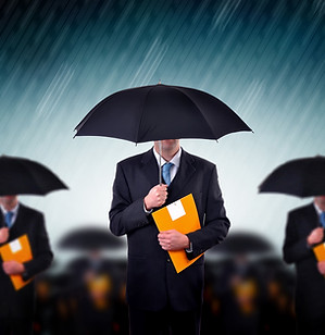 Businessmen with Umbrellas