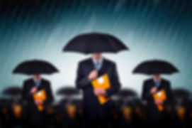 Businessmen with Umbrellas