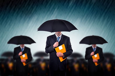 Businessmen with Umbrellas