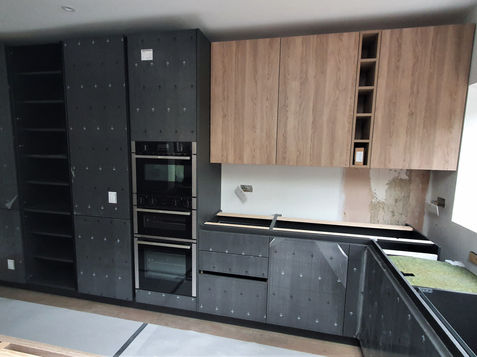 renovation, extension, installation, fitting, kitchen, luxury, kbb, siemens, gaggenau, bora, miele, bosch, neff, induction, ceramic worktop, granite, quartz, worktop, splashbacks, high-end, interior design, drawers, cabinets, shaker door, style, black, white, neolith, infinity, quooker, tap, sink, fridge, side by side, handles, buster and punch, dekton, German, flooring, glass units, samsung, apple, switch, door, framed, lights, pendant