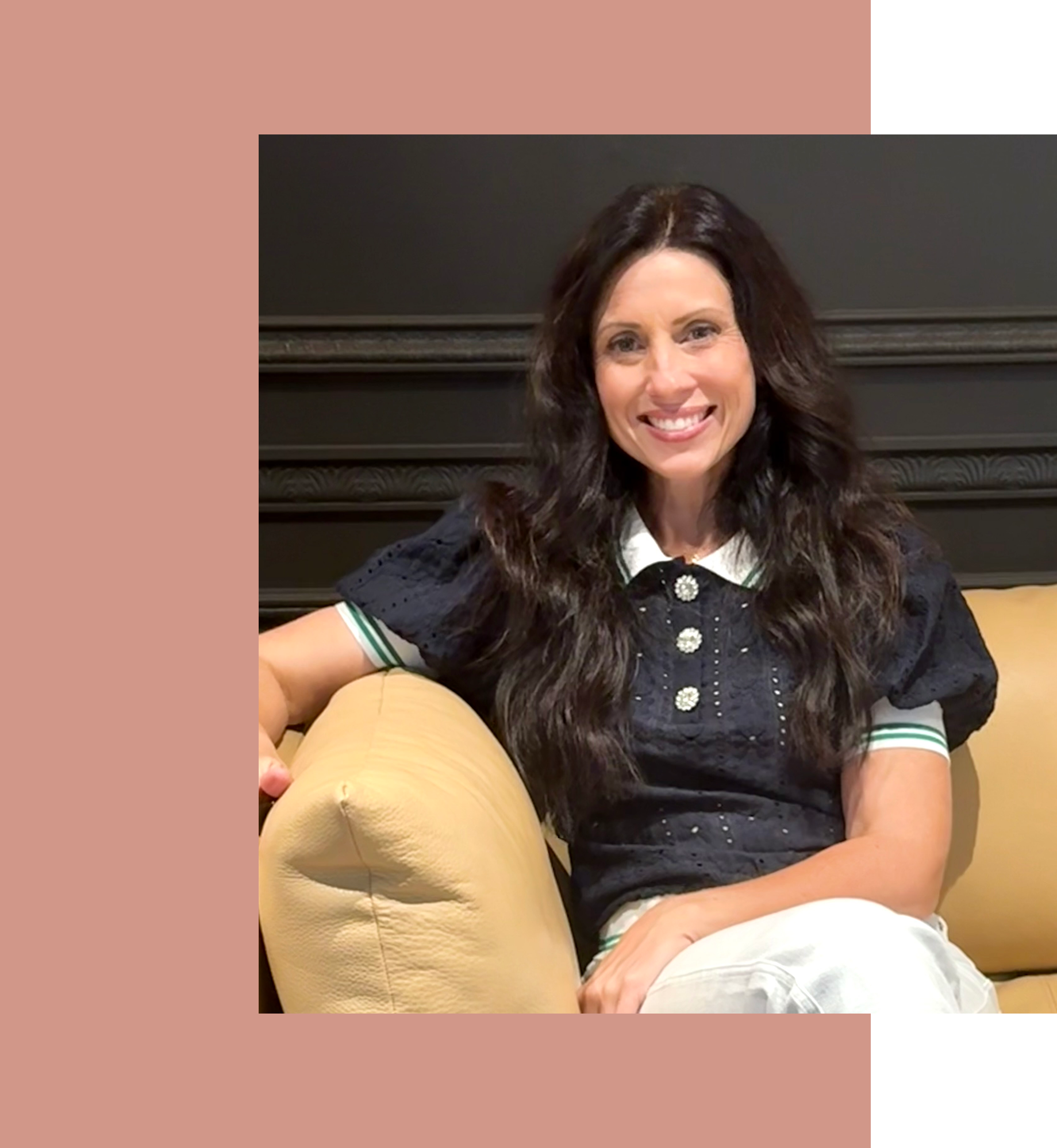 Kristel L. Mabie seated and smiling (therapist portrait)