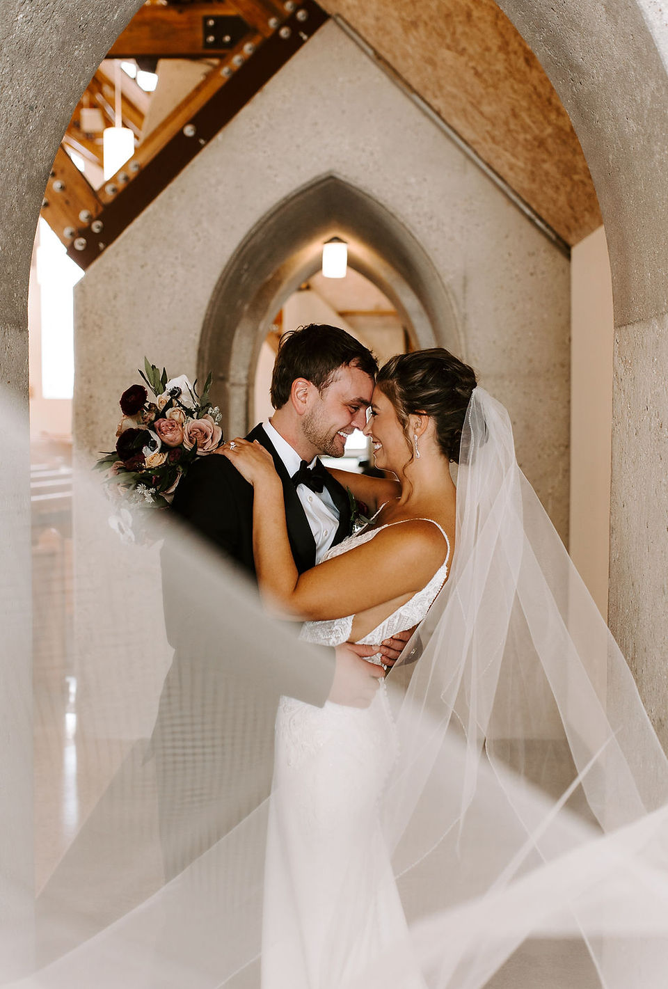 Bride and groom church wedding photos in Grand Rapids, Michigan.