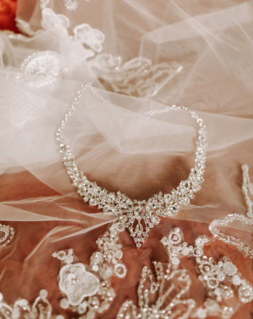Glamorous castle wedding diamond crown and earrings.