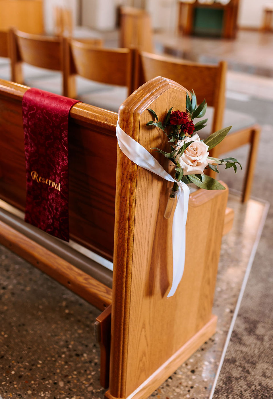 Classic church wedding ceremony aisle decor.
